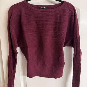 Express sweater in size XS in maroon color.